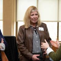 people discussing at event